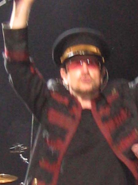 Blurry Bono with hat